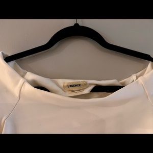 Excellent condition off shoulder cream top